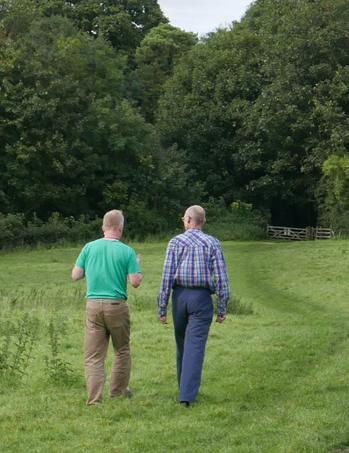 Therapist and client walking in nature